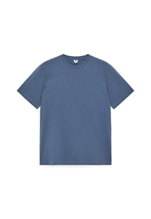 T-shirt uni à manches courtes et col rond, de couleur bleu doux, présenté à plat sur un fond blanc.