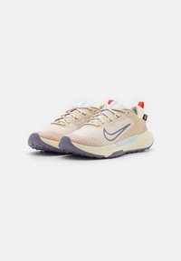 Nike Performance Chaussures de running - beige