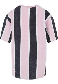 Short-sleeve T-shirt with vertical stripes in pink, navy, and white. Soft texture, crew neck, and relaxed fit.