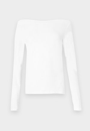White, long-sleeve off-the-shoulder top made of soft fabric. Features a clean, simple design with a straight neckline and fitted sleeves.