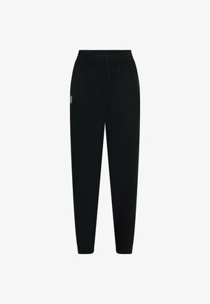 Pantalones de chándal negros entallados con cintura elástica y puños, con una pequeña etiqueta de logo lateral en la cadera izquierda.