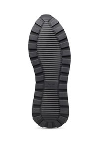Suola di scarpa in gomma nera con scanalature e creste profonde per una migliore aderenza. Logo al centro "VOILE BLANCHE" inciso in modo sottile. Forma ovale, superficie testurizzata.