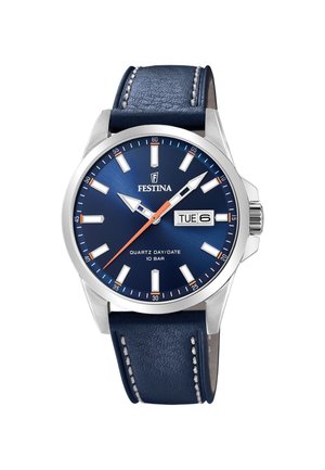 Montre à quartz pour homme avec un cadran bleu, un boîtier en acier inoxydable et un bracelet en cuir bleu marine. Parmi les fonctionnalités figurent un affichage du jour/date et des aiguilles luminescentes.