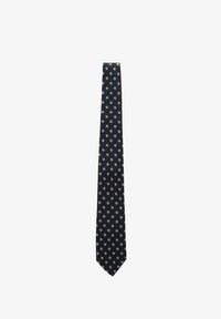 Unselected, navy blue polka dot