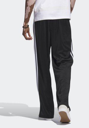 Pantalones deportivos - black
