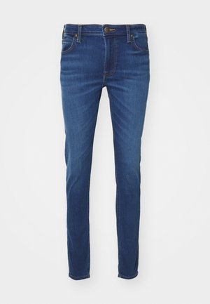 Schlanke, enge blaue Denim-Jeans mit glatter Textur, fünf Taschenstil und kontrastierenden Nähten. Mit einem Knopf- und Reißverschluss.