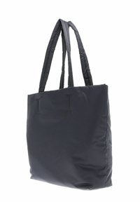 Sac fourre-tout rembourré gris foncé avec deux poignées matelassées, de forme carrée et présentant des détails de couture minimalistes. Fabriqué en matériau léger et résistant à l'eau.