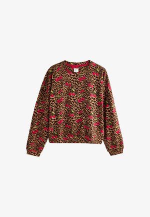 Bruine sweatshirt met een luipaardprint en rode kersen. Heeft lange mouwen en een ronde hals. Zachte stof met een losse pasvorm.