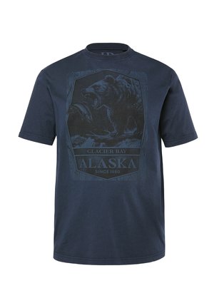 T-shirt in cotone blu navy con una grafica di un orso che tiene un pesce, etichettata "GLACIER BAY ALASKA DAL 1880" all'interno di una cornice esagonale. Maniche corte.