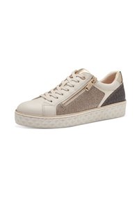 Sneaker beige con tessuto testurizzato e accenti dorati. Presenta una zip laterale, punta rotonda e una suola con motivo geometrico.
