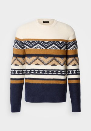 Pull en tricot avec col rond, crème, marine, moutarde et rayures géométriques à motifs. Texture douce avec ourlet et poignets à côtes.