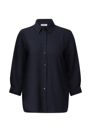 Navy blue shirt with a textured fabric, button front, and a pointed collar. Long sleeves with cuffs, relaxed fit, smooth finish.