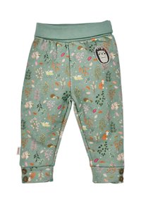 Grüne Baumwollhosen mit einem Blumen- und Tiermuster. Sie verfügen über einen breiten Bund, umgeschlagene Säume und zwei Knöpfe am Knöchel.