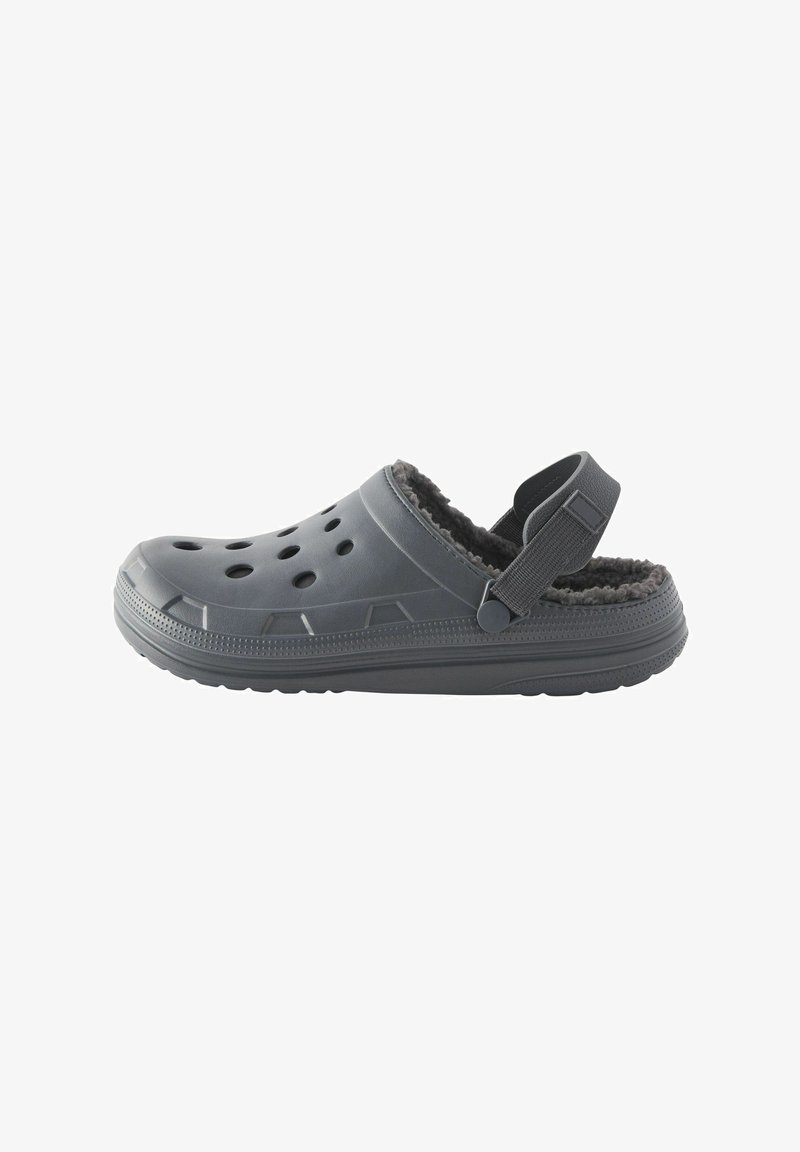 Gray clogs made of rubber-like material, featuring ventilation holes, fuzzy lining, and an adjustable heel strap for a secure fit.