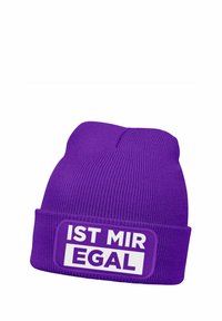 Purple knit beanie with a ribbed texture and a wide cuff. Features a rectangular patch with the text "IST MIR EGAL" in white on a purple background.