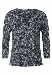 Granatowa bluzka z rękawami 3/4, ozdobiona geometrycznym białym wzorem i dekoltem w kształcie litery V. Miękka tkanina o gładkiej strukturze.
