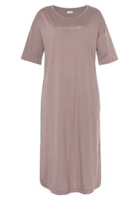 Light brown T-shirt dress in soft fabric, featuring short sleeves and a round neckline. “FALL IN LOVE” printed in gold across the chest.