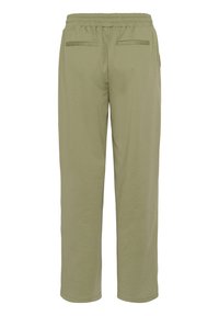 Pantalons de jogging vert olive clair en tissu doux, avec une taille élastique et deux poches arrière. Coupe droite sans motifs.