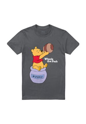 Charcoal gray T-shirt with Winnie the Pooh sitting in a purple "HUNNY" pot, holding a large honey jar, with text "Winnie the Pooh" beside him.