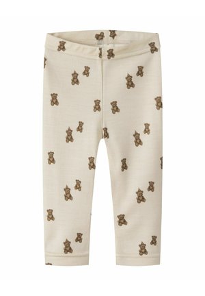Babyleggings i cremefarve med et overalt mønster af små brune tøjdyr, der bærer festhatte.