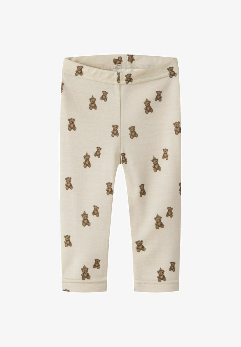 Leggings pour bébé de couleur crème avec un motif intégral de petits ours en peluche marron portant des chapeaux de fête.