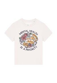 T-shirt en coton blanc présentant une illustration d'un cerveau entouré de roses, avec le texte "LA SANTÉ MENTALE EST UNE PRIORITÉ."
