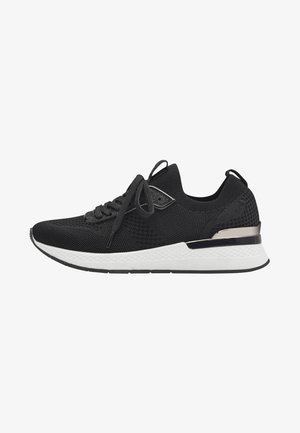 Black athletic sneakers featuring a textured knit upper, flat laces, white cushioned sole, and a metallic accent at the heel.