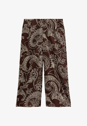 Pantalones marrones de pierna ancha con patrones intrincados blancos de paisley y flores por toda la tela.