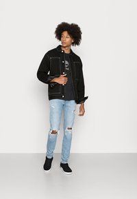 Levi's® SKINNY TAPER - Calças de ganga de corte skinny - lefkas moonlit