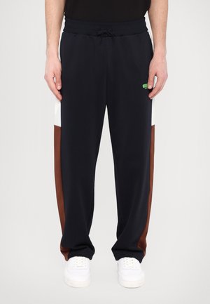 TROUSER - Tracksuit bottoms - blue