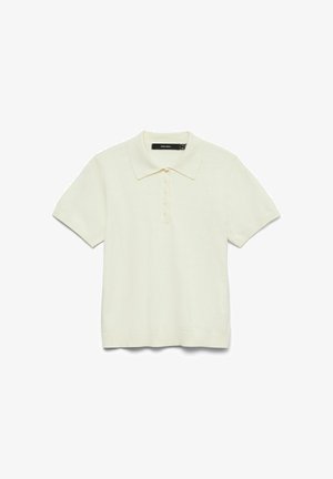 Lühikeste varrukatega polosärk pehmest kreemjasadekangast. Omadusteks on klassikaline krae, seitsme nupuga esikinnis ning soonikkoes sügisrandmed ja varrukasääred, mis annavad istuva välimuse.