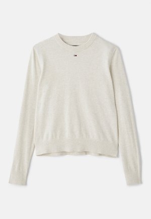 Maglione beige chiaro con maniche lunghe, colletto tondo e polsini e orlo a coste. Presenta un piccolo logo sul petto. Texture in maglia morbida.
