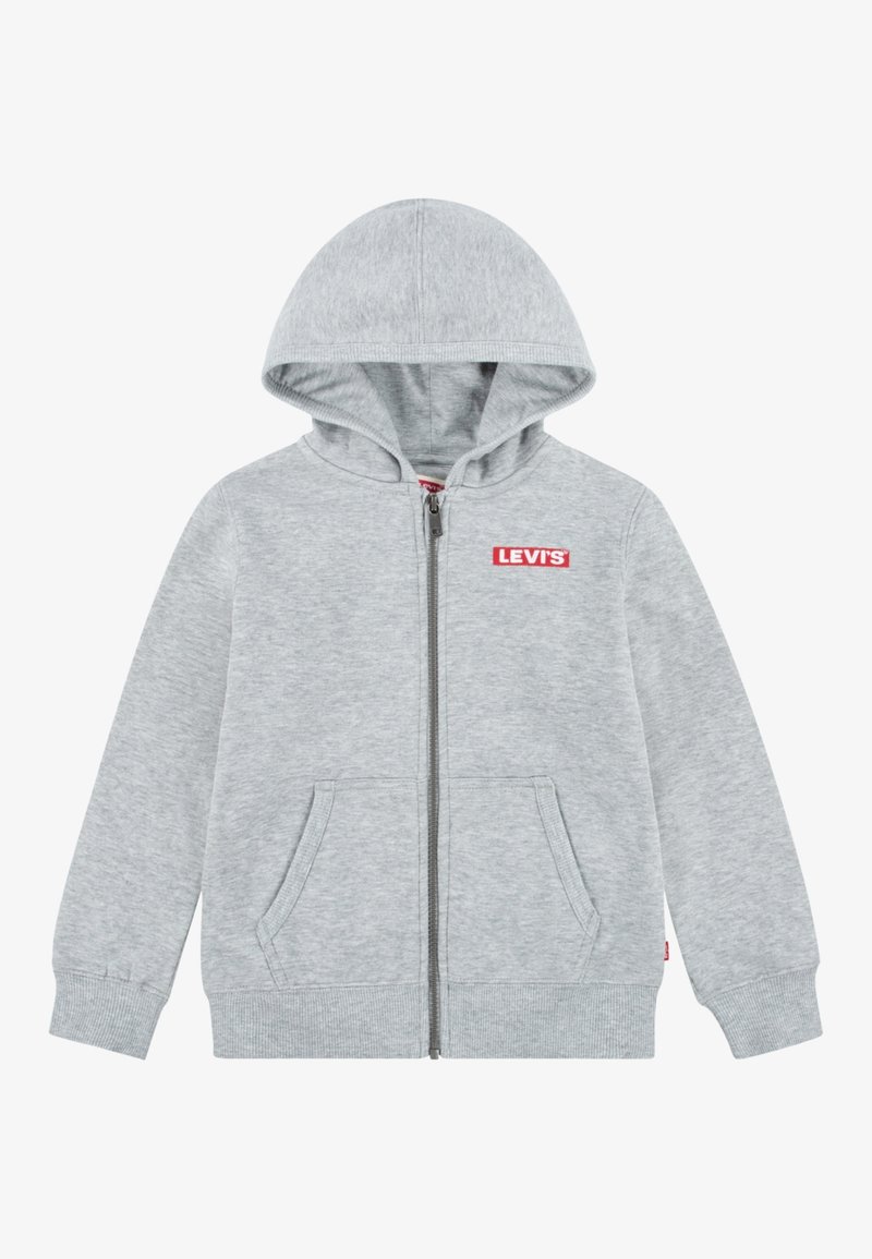 Sweat à capuche gris clair zippé avec poches avant, poignets côtelés et patch logo Levi's sur la poitrine gauche.