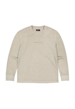 Long-sleeve light beige shirt made of soft fabric, featuring a crew neck and the text "BUTCHER OF BLUE" embroidered on the front.