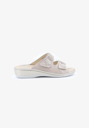 Sandalo beige aperto davanti con due cinturini regolabili a strappo e suola leggermente rialzata, ideale per un look casual.