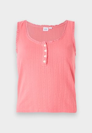 Ροζ, αμάνικο κορμάκι με υφή κάθετης ρίγας, στρογγυλή λαιμόκοψη και σειρά από πέντε κουμπιά ως διακοσμητικά.