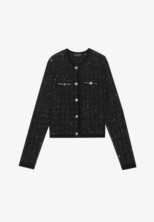 Fekete tweed kardigán ezüst szálakkal, kerek nyakkal, hosszú ujjal és díszes gombokkal. Bonyolult mintákkal és texturált anyaggal rendelkezik.