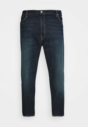 Donkerdenim jeans met een rechte snit, voorzien van een vervaagde afwerking. Inclusief een klassiek vijfzakontwerp en metalen knoopsluiting.