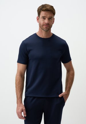 Marineblaue, kurzärmelige T-Shirt mit Rundhalsausschnitt aus glattem Stoff; einfaches Design ohne sichtbare Muster oder Akzente. Lässiger Schnitt.