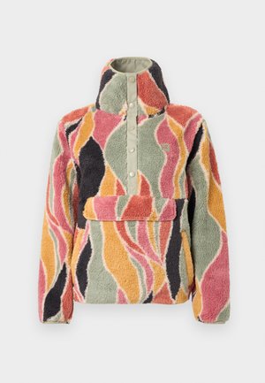 Bluza polarowa z wysokim kołnierzem i zapięciem na zatrzaski. Posiada falisty, wielokolorowy wzór w kolorach różowym, zielonym, pomarańczowym i czarnym.