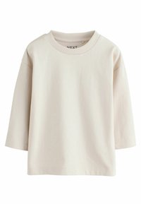 Beige langärmliges T-Shirt aus weicher Baumwolle, mit Rundhalsausschnitt, lässiger Passform und geradem Saum ohne Drucke oder Muster.