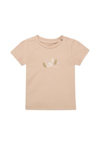 Hellbeige kurzärmeliges T-Shirt aus weicher Baumwolle, mit einem kleinen, mehrfarbigen pflanzenmotivierten Grafik auf der Vorderseite und einem Druckknopf an der Schulter.