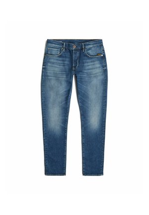 Blue denim jeans with a straight cut, light fading, five-pocket design, and a single button fly. Features a small logo patch on the waistband.