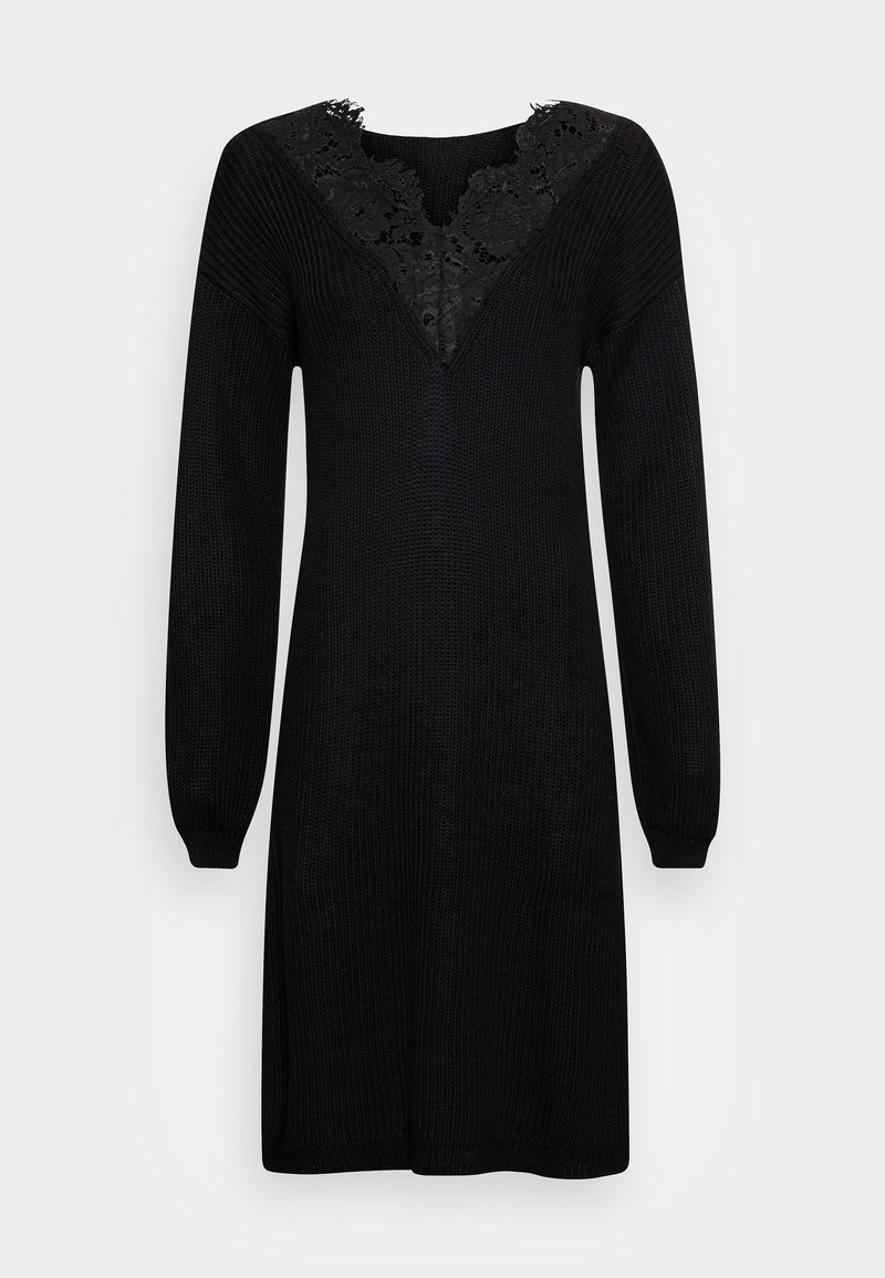 Schwarzes gestricktes Kleid mit langen Ärmeln und V-Ausschnitt. Spitze Details am Ausschnitt sorgen für Textur. Weicher Stoff mit lockerer Passform.