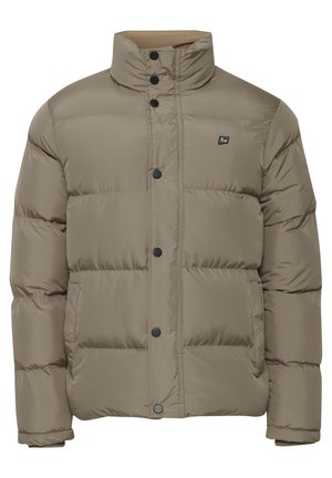 Beige Steppjacke mit hohem Kragen, ausgestattet mit schwarzen Knöpfen und einem kleinen Logo auf der linken Brust. Strukturiertes, isoliertes Design mit einer kastigen Passform.