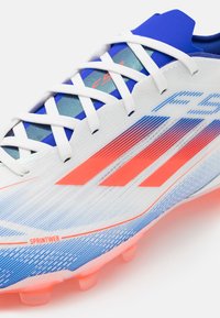 adidas Performance F50 PRO MULTI-GROUND - Scarpe da calcio per terreni duri - footwear white/solar red/lucid blue
