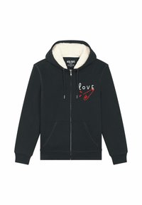 Haut à capuche zippé gris foncé avec un intérieur en polaire, poches avant, et un texte graphique "love" avec un design d'épingle de sûreté rouge sur la poitrine.