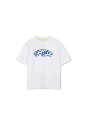 Witte katoenen T-shirt met een blauw en geel grafisch ontwerp van "TIMBERLAND" met daarboven "OPGERICHT 1973", losse pasvorm, korte mouwen.