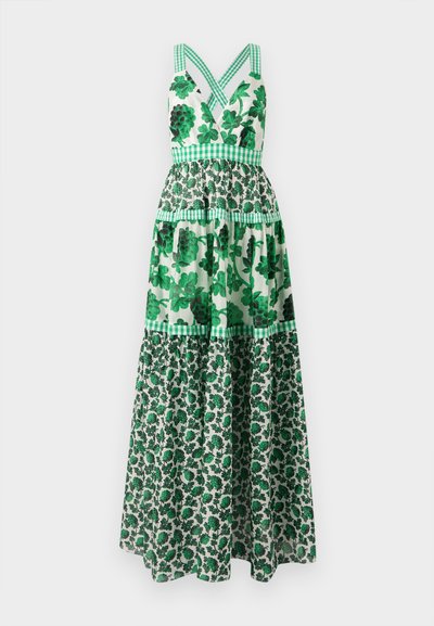 Groene bloemenmaxi-jurk met een aansluitende корпус, gekruiste bandjes, gelaagd ontwerp en geruite accenten. Gemaakt van een lichte stof.
