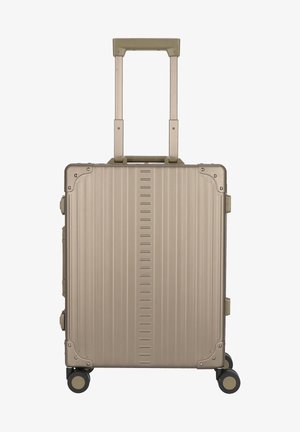 TRAVELER - Wheeled suitcase - bronce